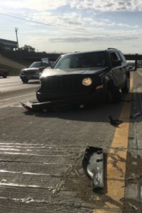 Smashed front end of a car after Dallas accident