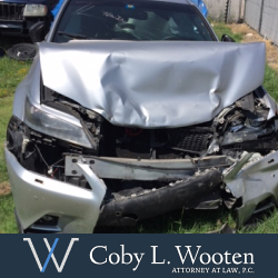 Heavily damaged car after head-on collision in Forth Worth, Texas