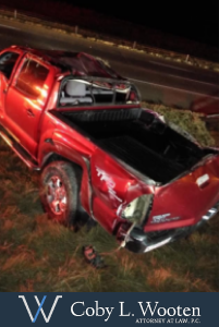 Damaged truck after a rollover accident in Houston