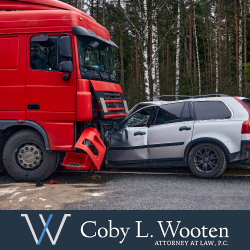 Head-on collision between truck and car