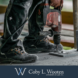 Texas Construction worker using heavy equipment