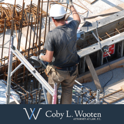 Construction worker standing on scaffolding